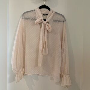Swiss dot cream bow tie top.